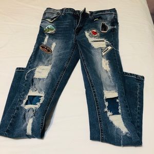 Limited edition distressed patched  jeans size 26